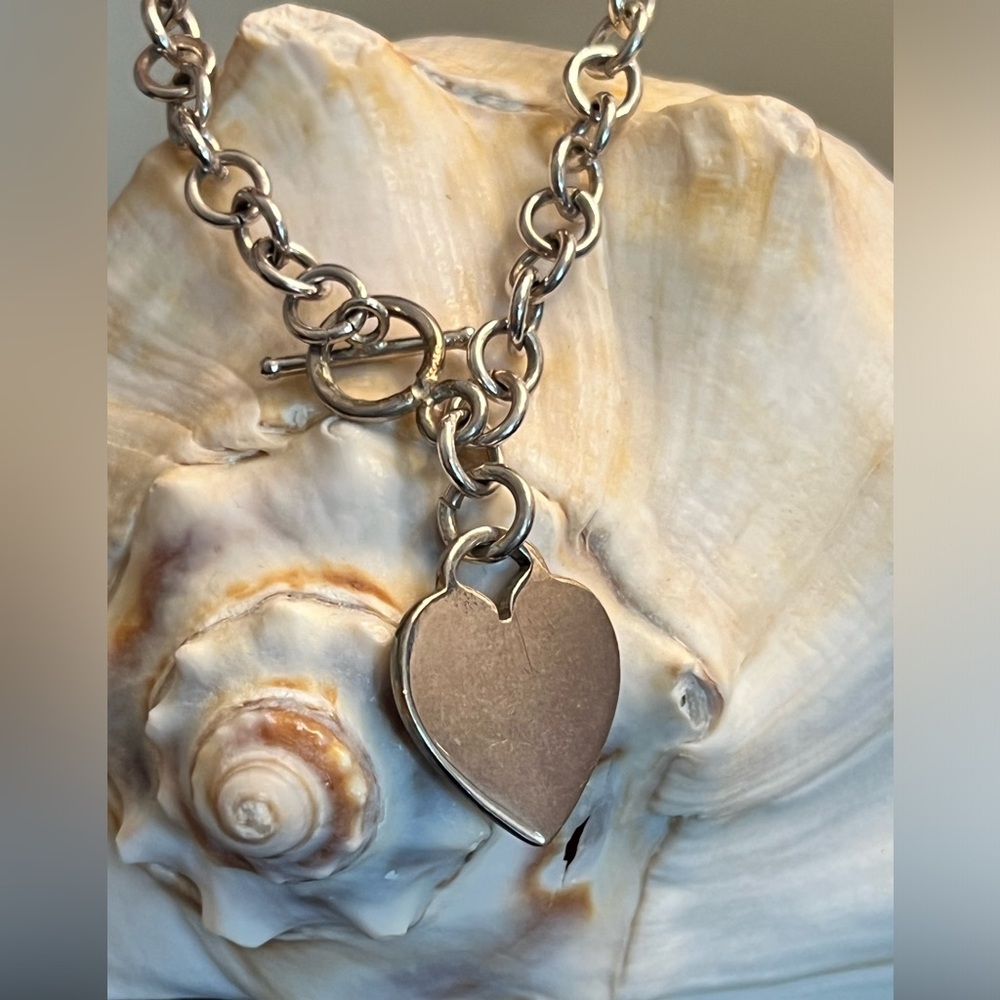 Sterling silver chain necklace and bracelet set with heart charm.